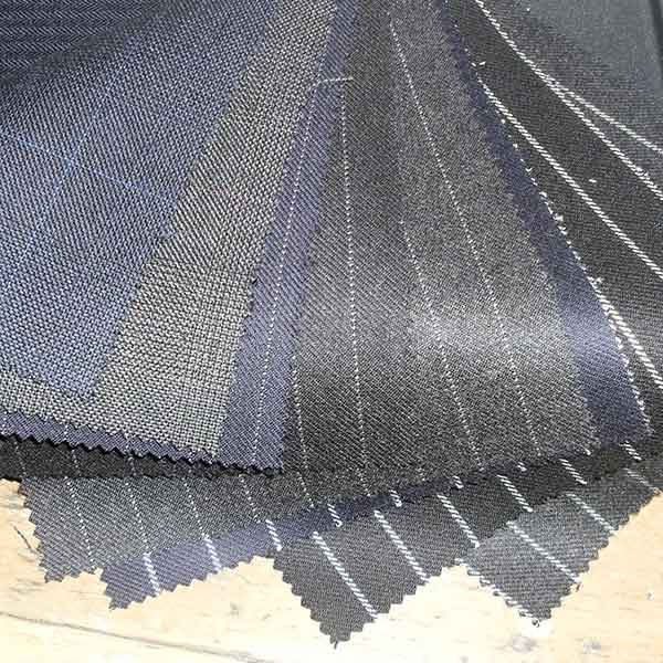 Village Tailors cloth samples for bespoke suits, jackets, trousers, shirts and coats